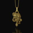 Bild in Galerie-Betrachter laden, Silver Medusa Skull Pendant, Snake Necklace Design, Memento Mori Reminder, Symbol of Power & Mystery Gold Finish
